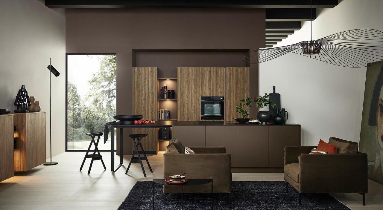 Real Nolte kitchen installed by WoodDeluxe in Montenegro, open-plan living and kitchen in warm brown tones
